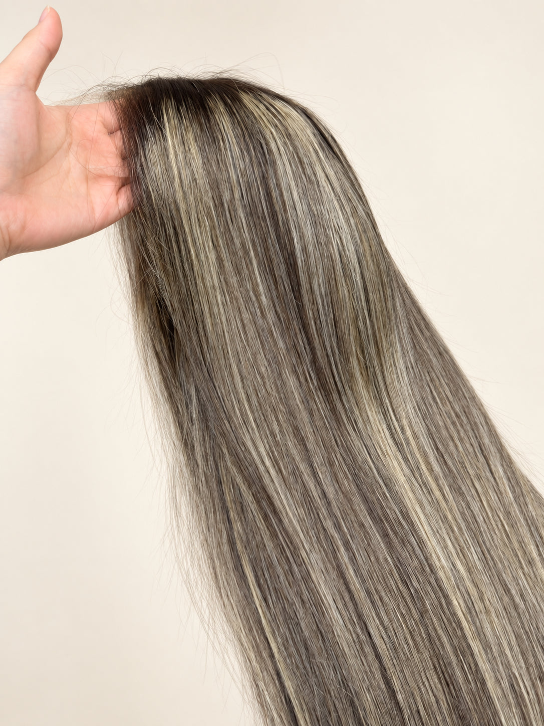 Ash blonde highlighted hair color